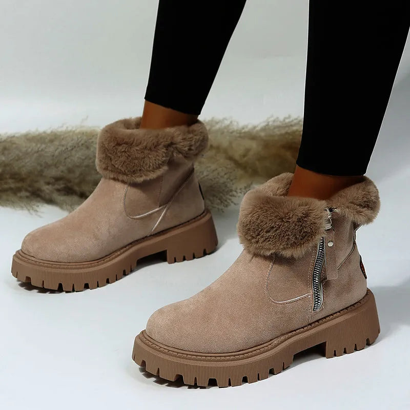 Black women's high-top snow boots with side zipper, faux suede upper, and non-slip rubber sole.