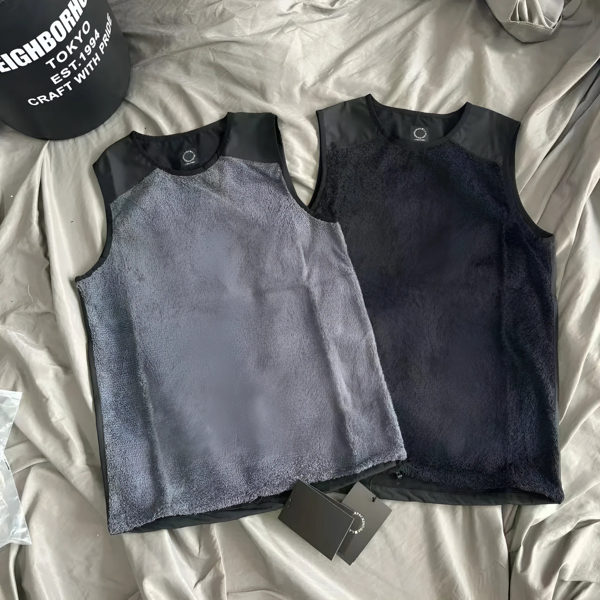 Men's lightweight fleece lined thermal vest in black solid colour with loose fit