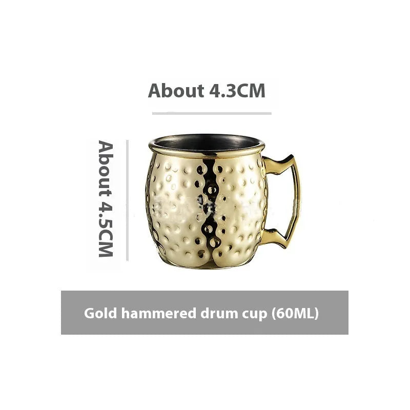 Stainless steel Moscow Mule cup with copper plating in hammer point style showing metallic finish.