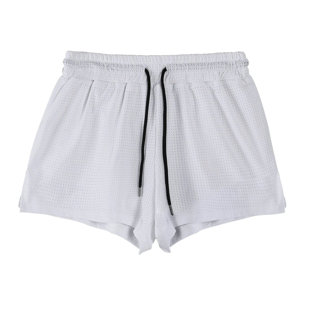 Man wearing black quick-dry nylon summer shorts, showing mid-waist sports leisure style.