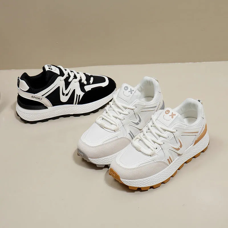 Women's black lace-up platform casual sports shoes with round toe and flat heel.
