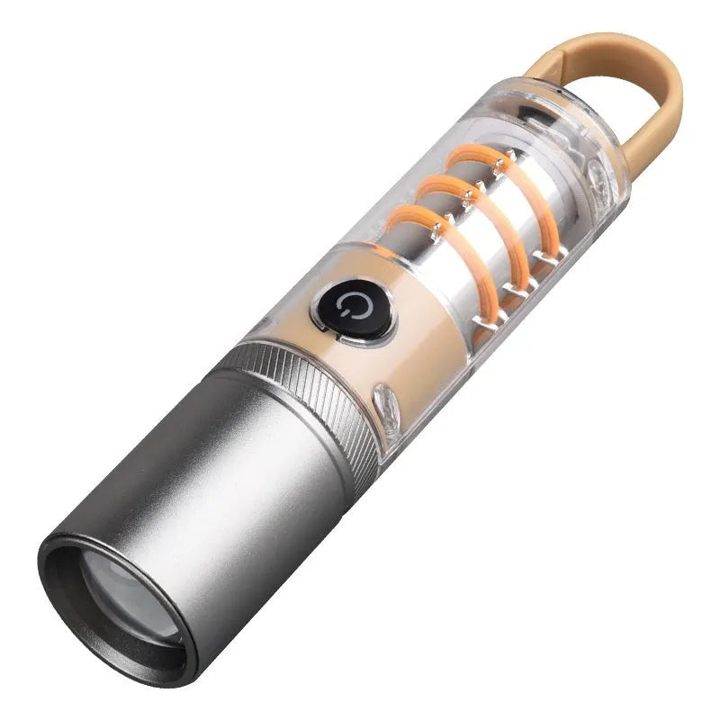 Orange and beige dual light source flashlights with optical zoom and keychain hooks