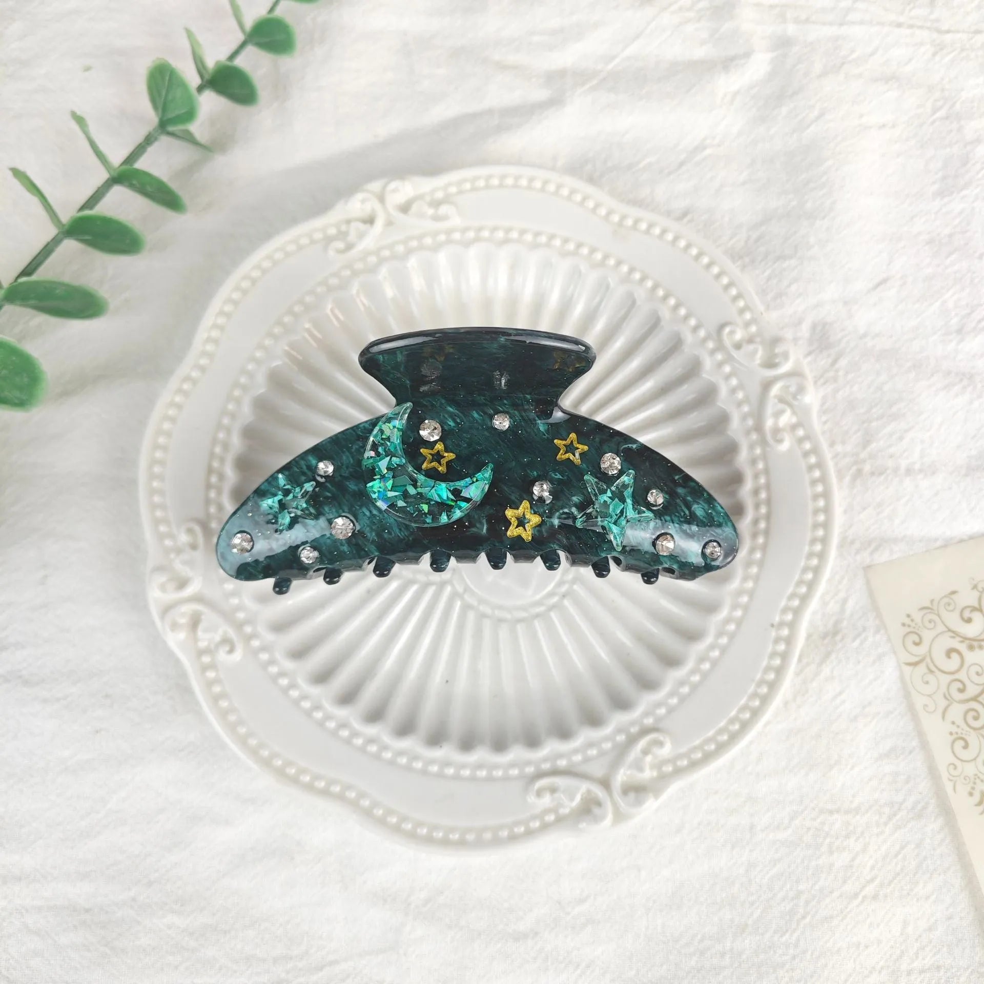 Oversized star moon barrette in celestial colours with irregular minimalist design