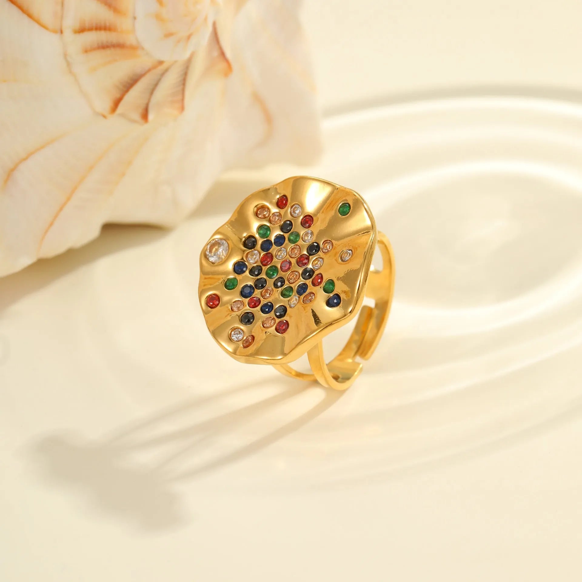 Geometric titanium steel ring with pleated band and coloured crystal inlays, open-mouth adjustable design