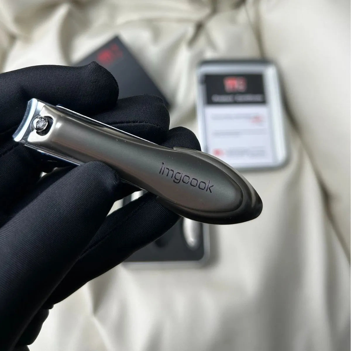 Three-piece anti-splash nail clippers set in black colour made from alloy and stainless steel