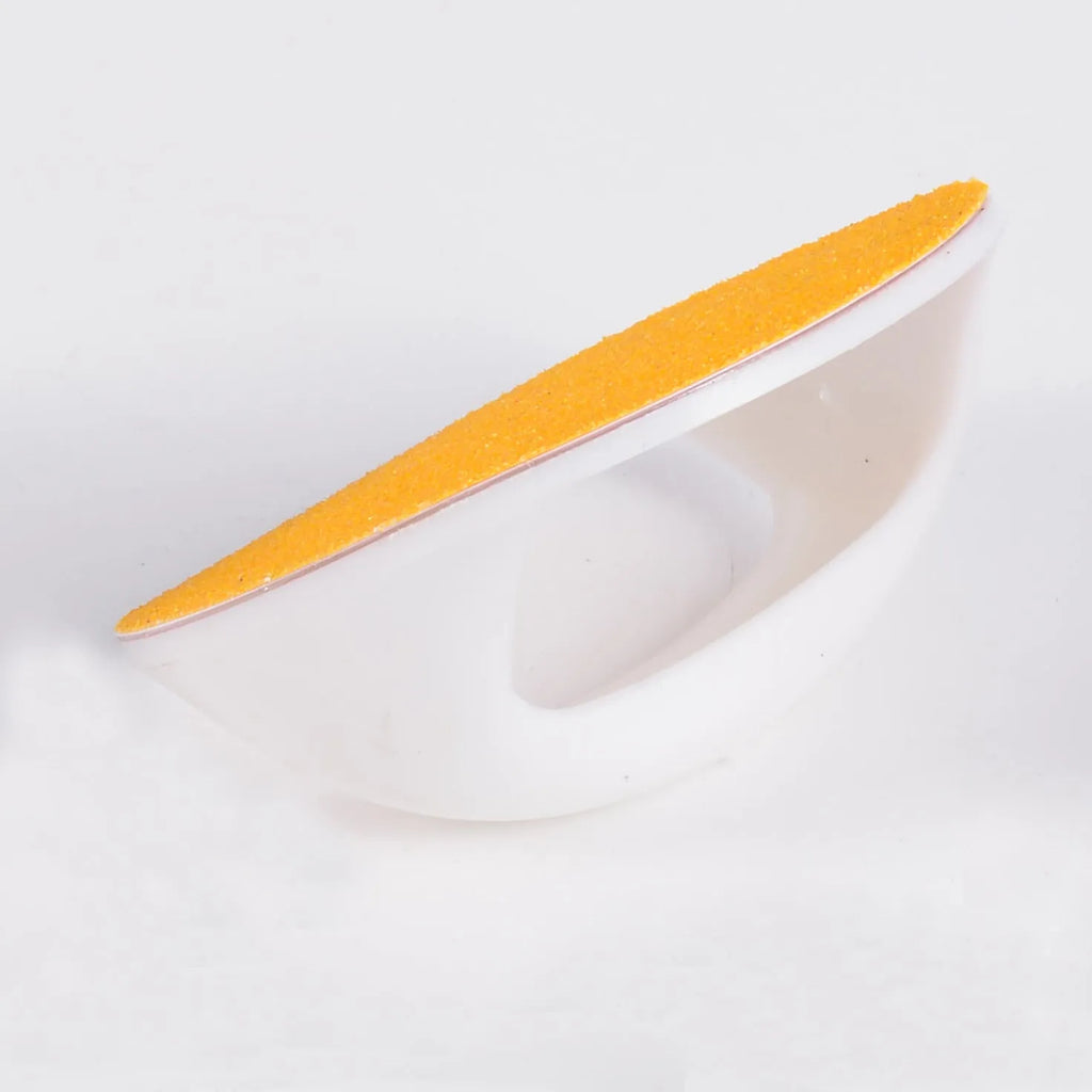 Round dog nail scratch board with ergonomic handle in one of four colours.