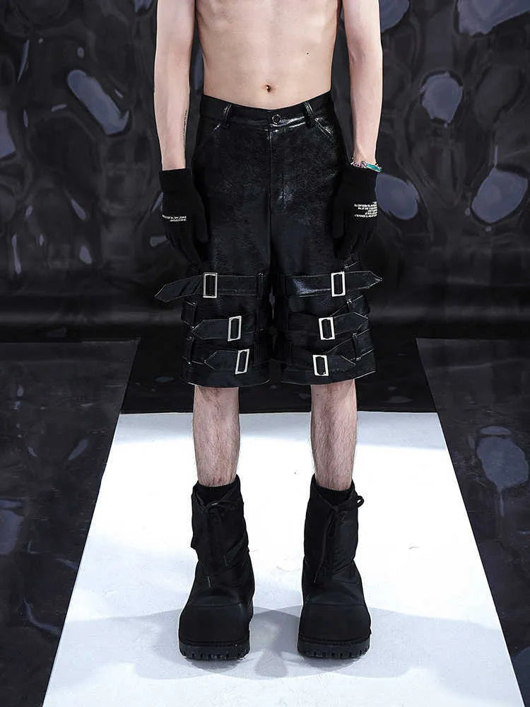 Men's black casual cropped pants with leather ring detailing on PU leather sections