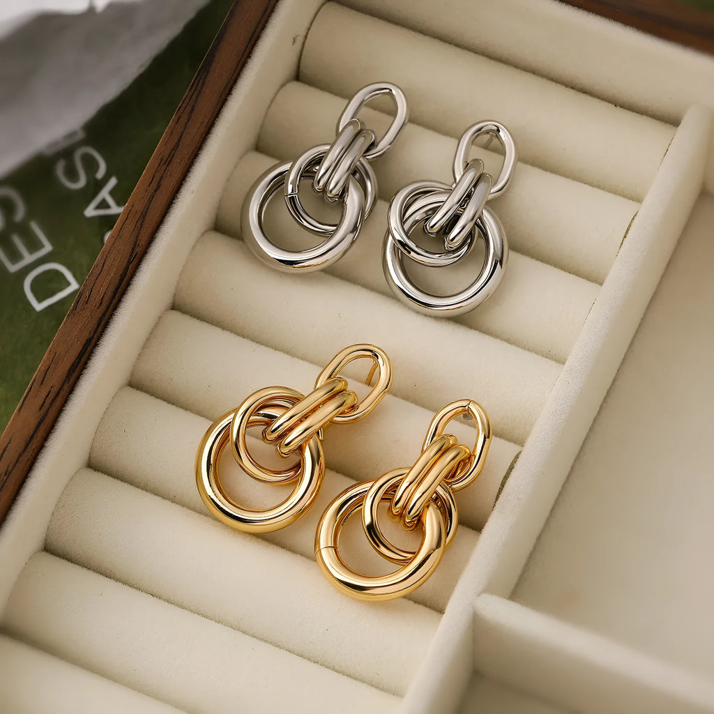 Geometric copper earrings with 18K gold plating in irregular shapes approximately 20-24cm long