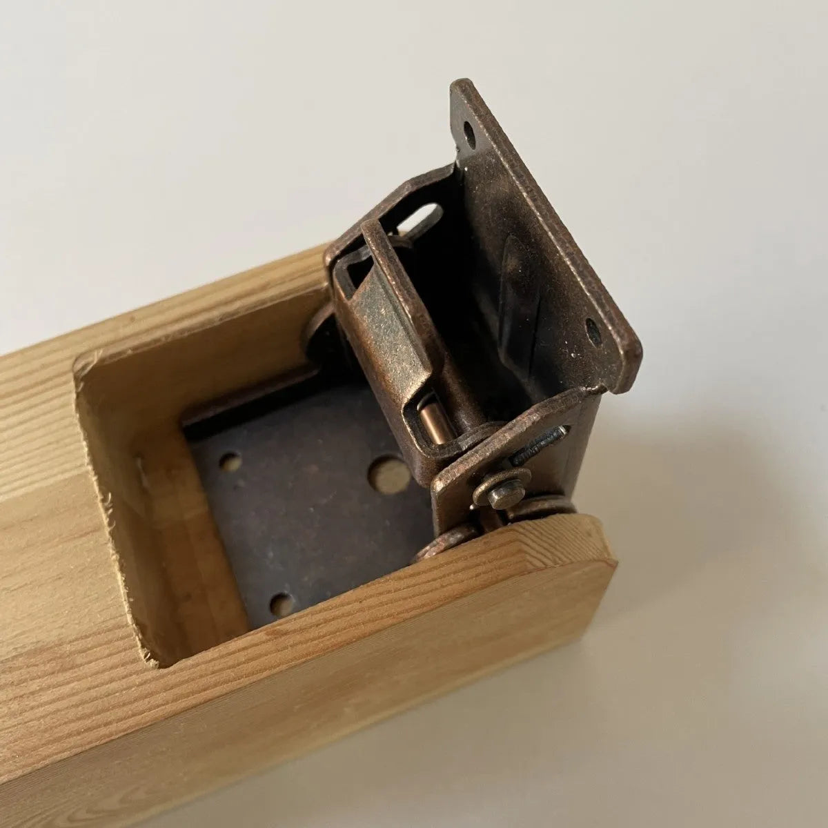Furniture foot folding hinge with electroplated finish for cabinet doors