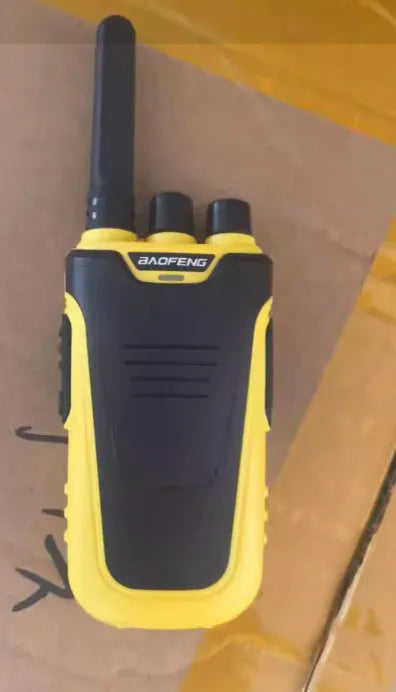 Red or yellow children intercom showing 10W power, 8km range, and 6800mAh battery capacity