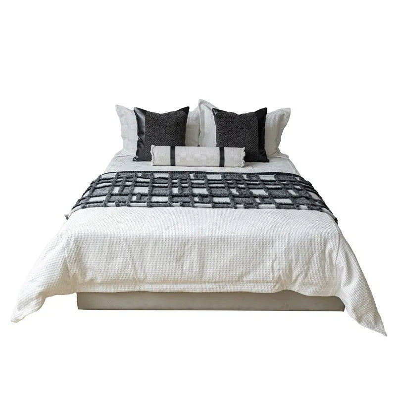 Modern grey and white plaid bed runner set with leather round pillow on 1.5m bed