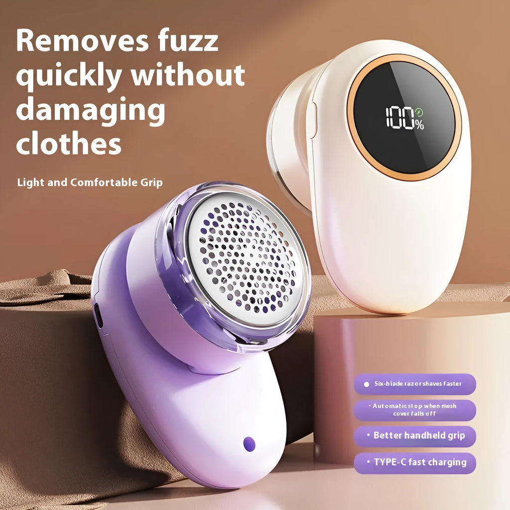 Purple and beige electric fur ball trimmer with digital display and multiple cutter head options on a table.