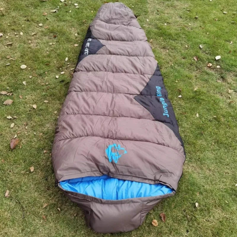 Mummy style camping sleeping bag in Army Green colour with compression storage bag.
