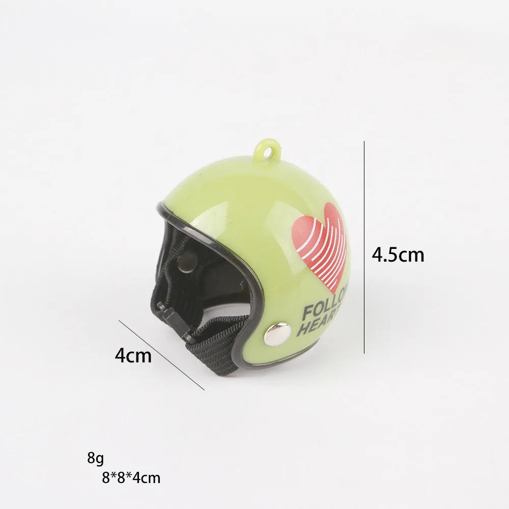 Small hard plastic pet helmet with elastic adjustment straps and sponge lining for chickens and birds