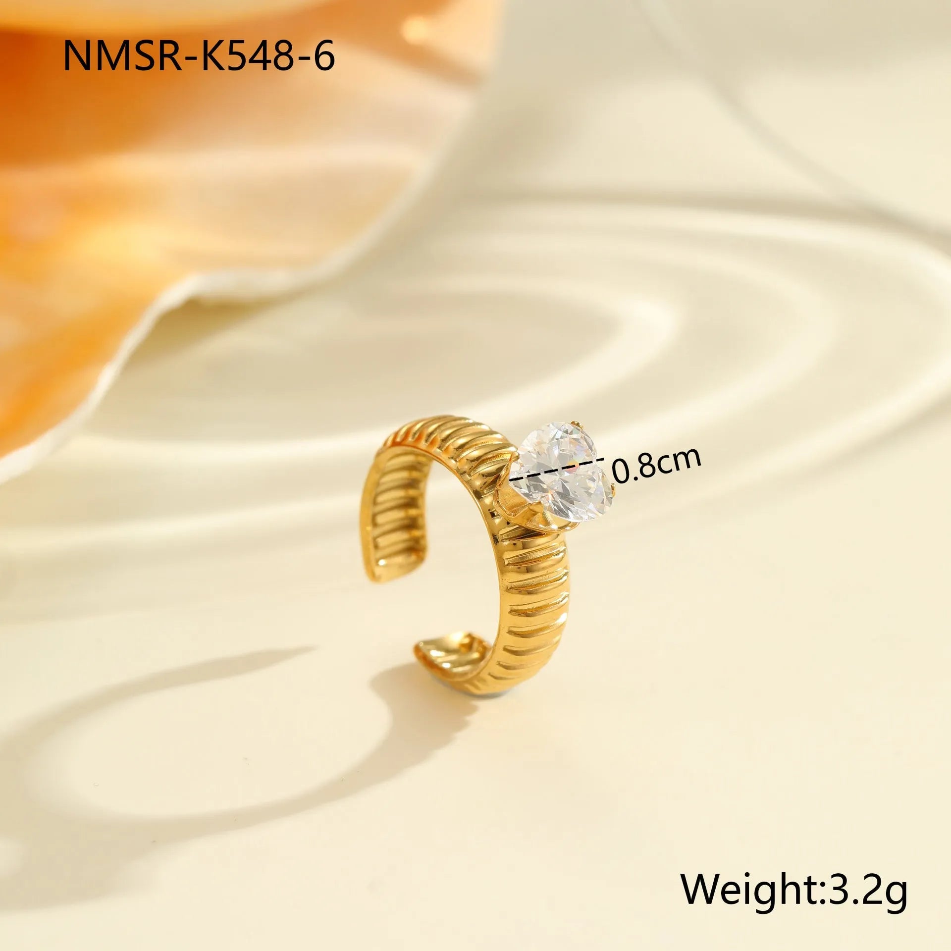 Gold electroplated stainless steel ring with zircon stones and open mouth adjustable design