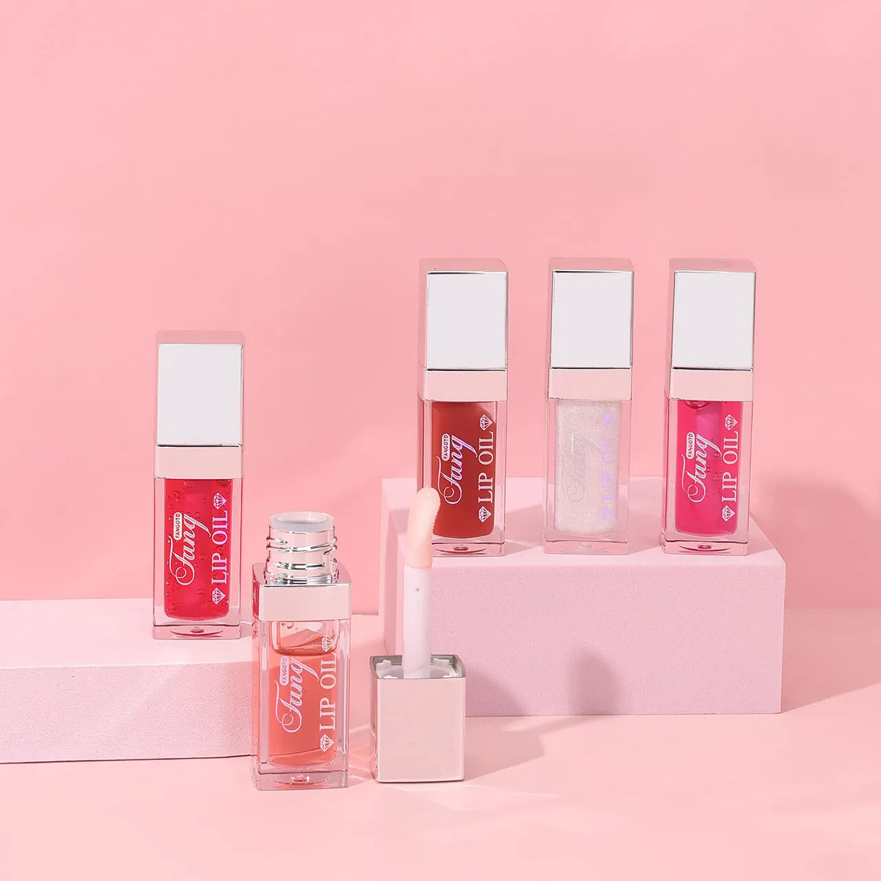 Five colour mint lip gloss tubes with moisturising formula and applicator