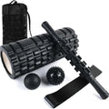 Black fitness foam roller measuring 33cm with EVA and PVC construction for muscle massage