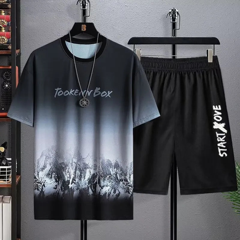 Men's light grey summer shorts suit set consisting of a short-sleeve T-shirt and matching shorts on a hanger.