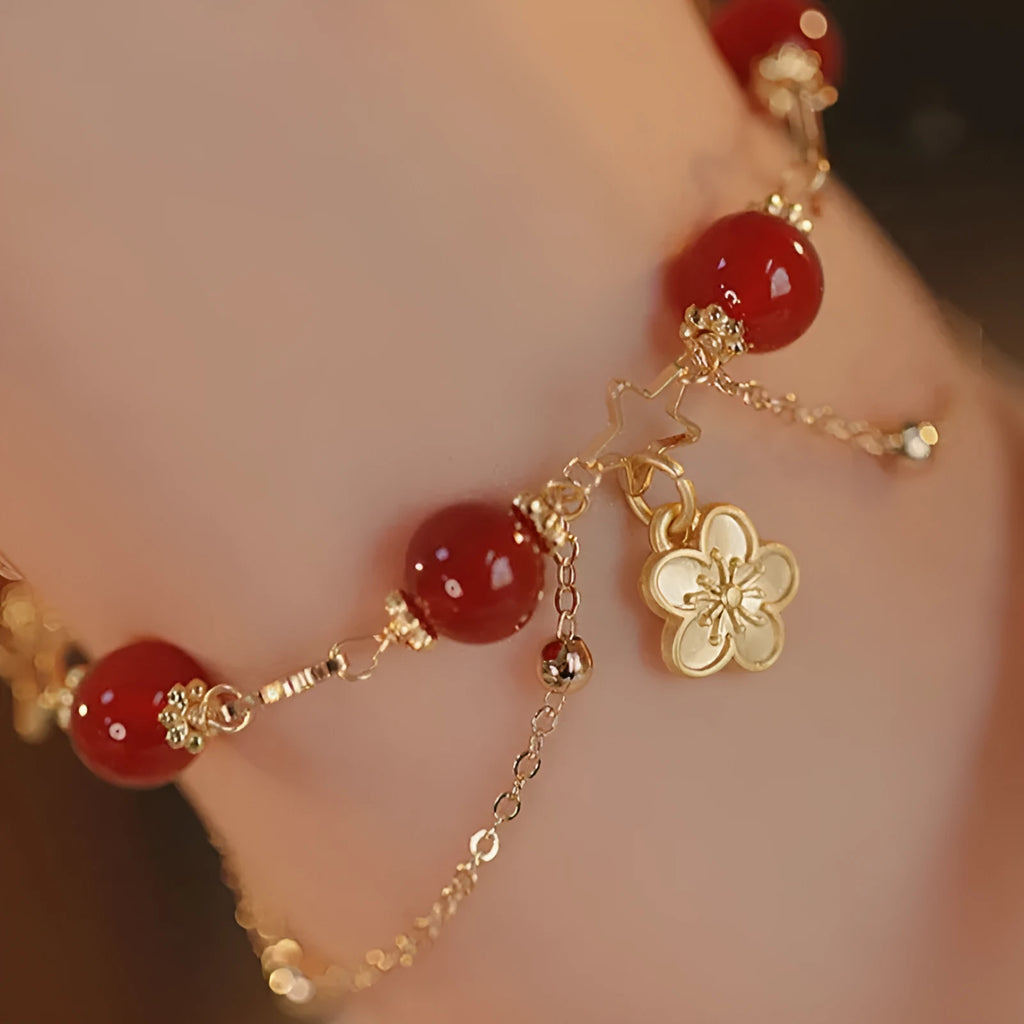 Red agate double layer women's bracelet with floral and peach blossom designs on natural stone