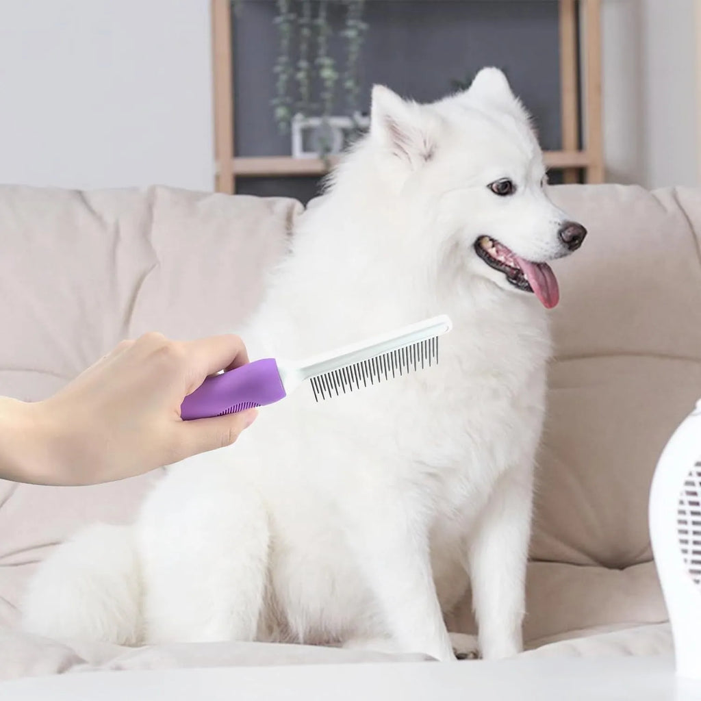 Purple pet grooming comb with stainless steel long and short teeth on a purple ergonomic handle.