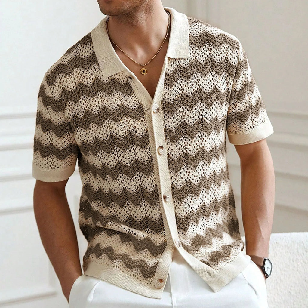 Blue hollow jacquard corrugated short sleeve sweater on a hanger, showing textured weave detail.