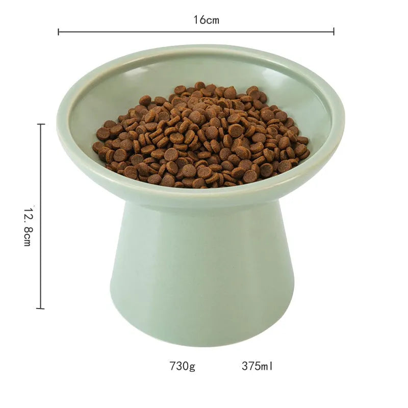 Blue ceramic elevated cat food bowl with wide shallow design next to a matching water bowl.