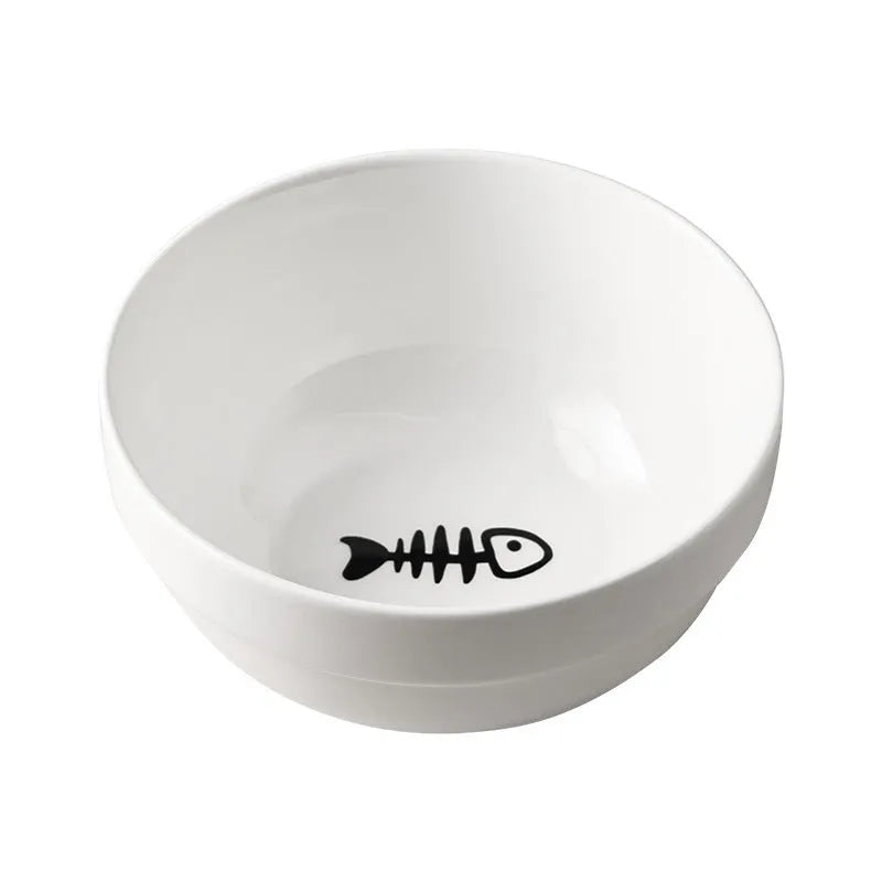 White ceramic cat bowl with cat paw print pattern in a black iron cat-ear frame