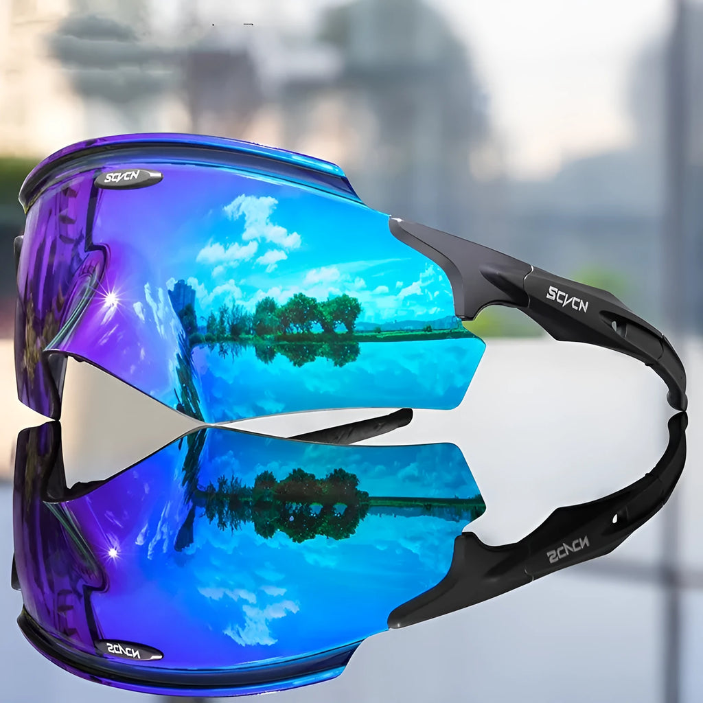 Frameless windproof sports goggles with an integrated colourful lens, shown in a sporty setting.