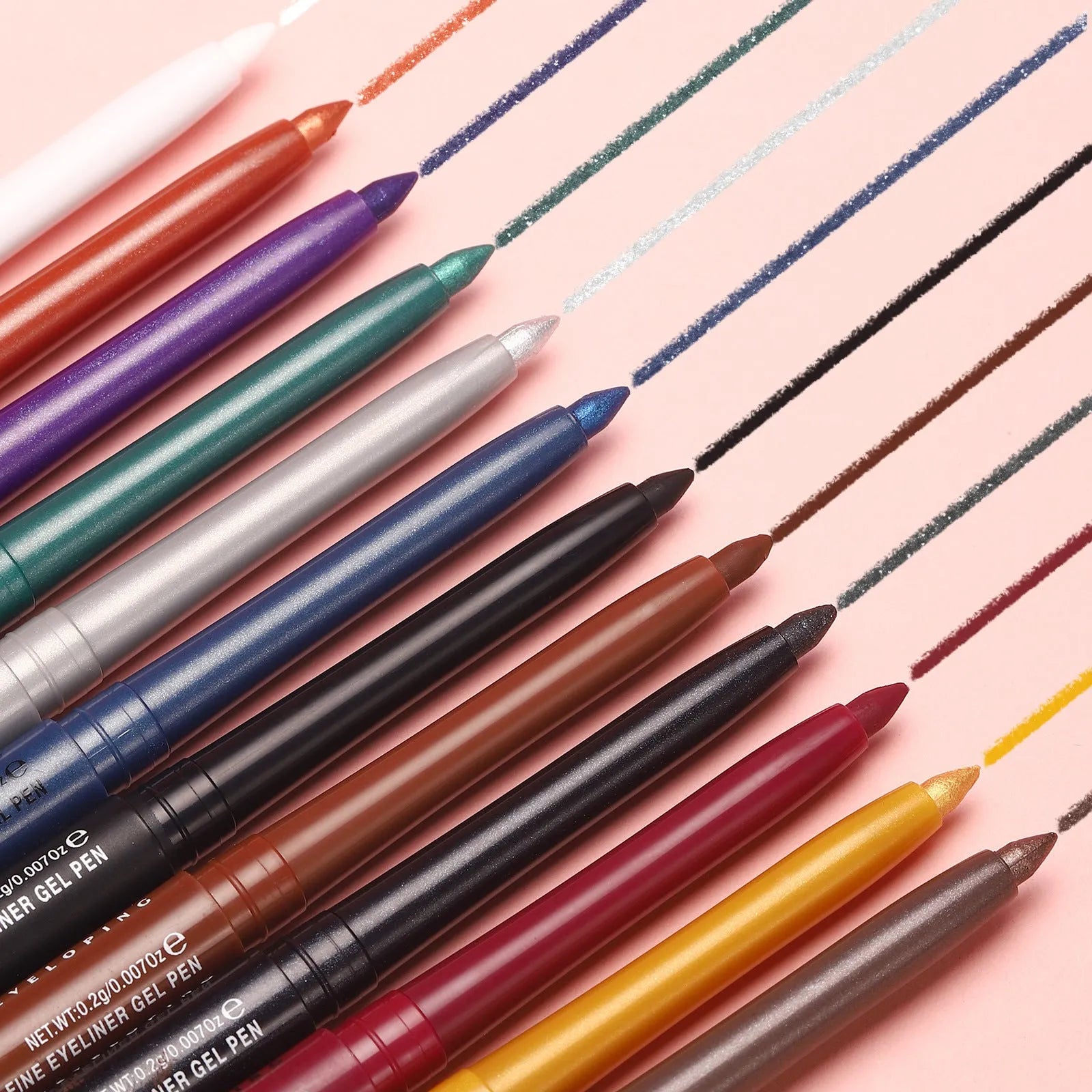 Set of 12 colourful gel glitter eyeliner pencils showing matte, metallic, pearl, and glitter finish effects