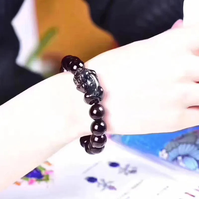 Natural ice colour eye obsidian crystal bracelet showing bead detail and available size options