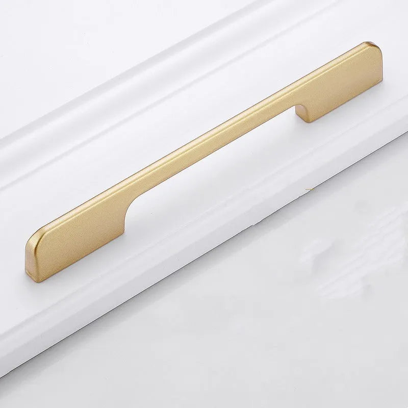 Modern gold aluminium alloy single-hole cabinet handle with T-shape design.