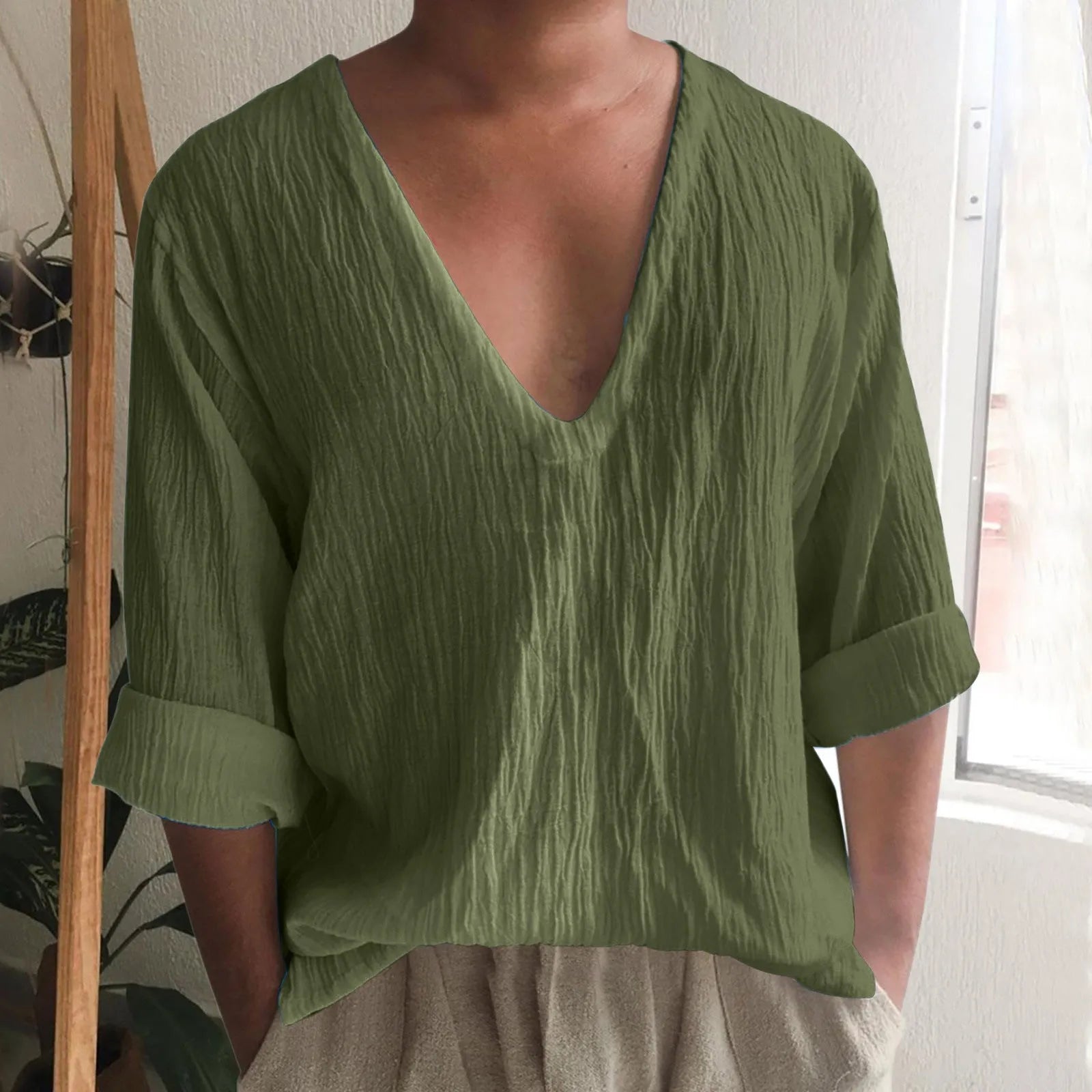 Men's solid colour long sleeve V-neck T-shirt in washed cotton and linen blend.