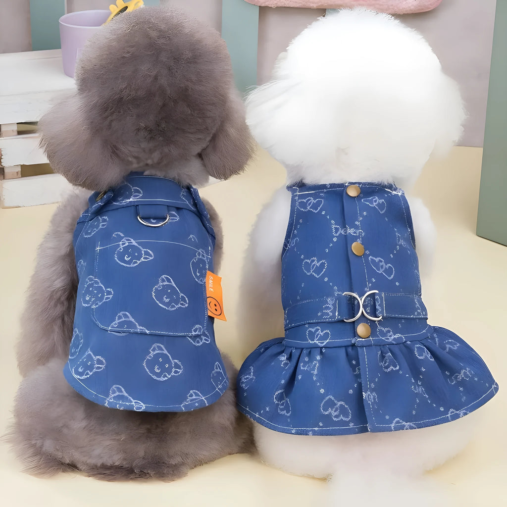 Small dog wearing denim princess dress with bracket skirt styling in blue denim fabric