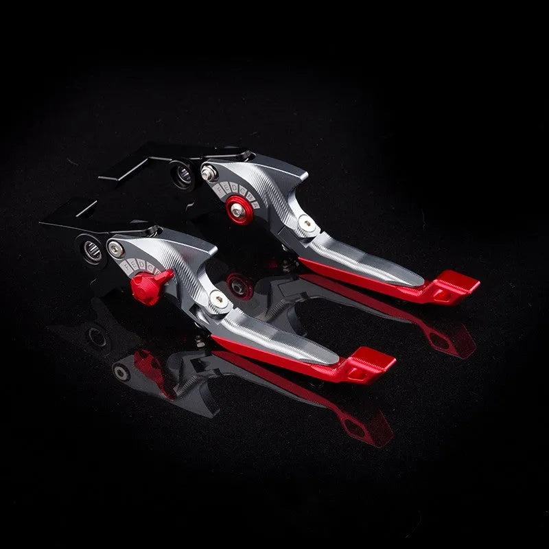 Pair of anodised metal motorcycle horn handle clutch levers with six-speed adjustable length, shown in a selection of colour finishes