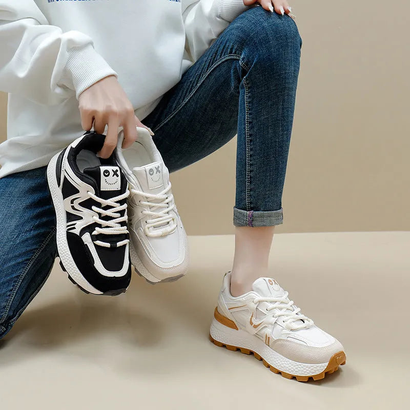 Women's black lace-up platform casual sports shoes with round toe and flat heel.