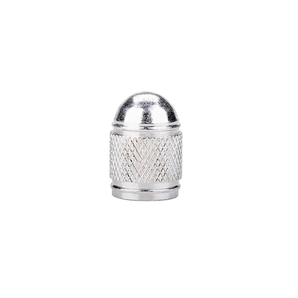 Aluminium alloy mountain bike tyre valve cap in gold, red, silver, blue, and black colours.