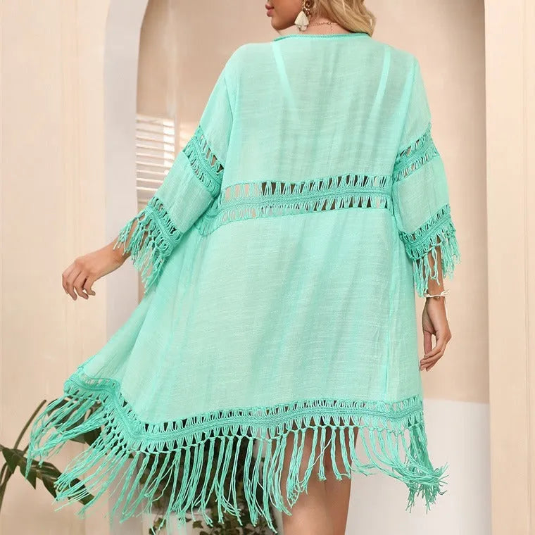 Women's hand-crocheted beach cover-up cardigan with tassel detailing in solid colour