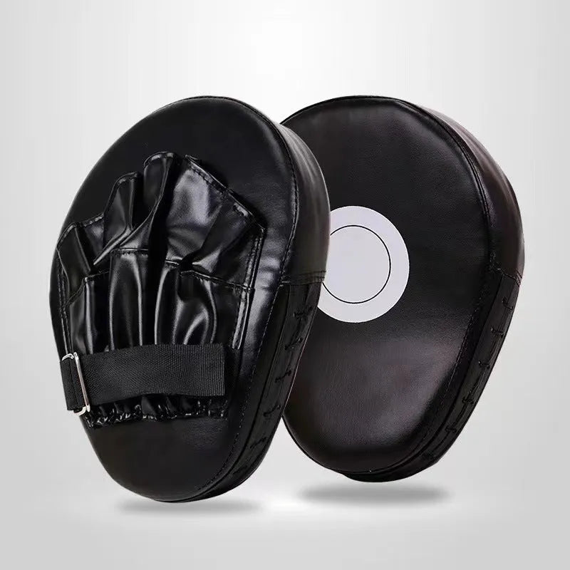 A pair of PU punch mitts for boxing and Muay Thai training, shown in a red edge and black surface colour variant.