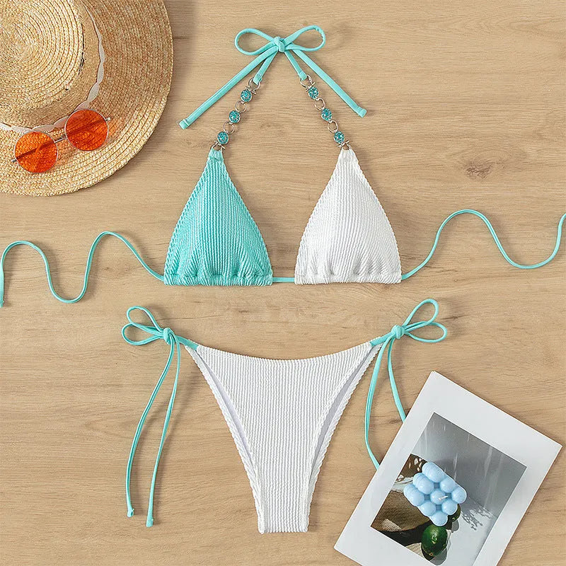 Women's lace-up swimsuit with pearl chain trim and matching shorts in colour matching design