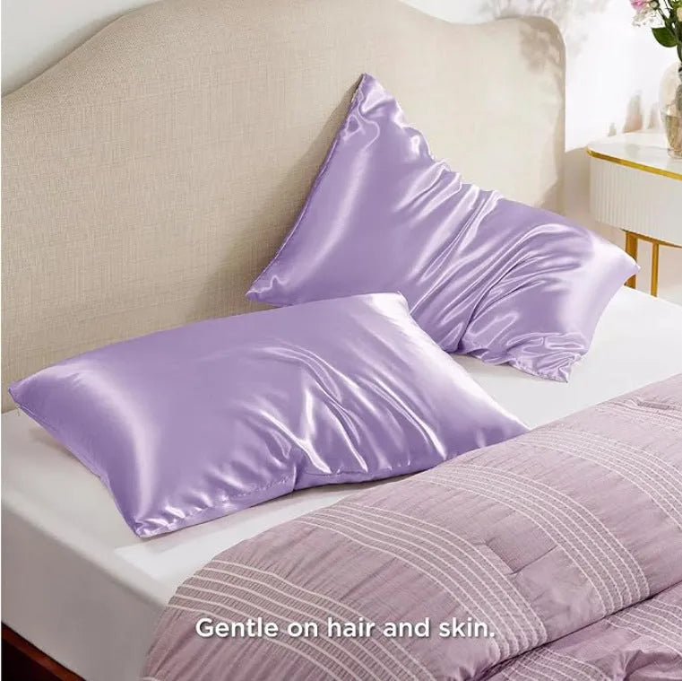 Pair of solid colour satin cloth pillowcases in polyester fibre available in twelve colours and four sizes