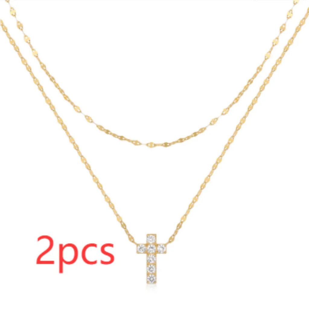 S925 Sterling Silver necklace with a geometric double-layer cross pendant featuring twin diamond detailing.