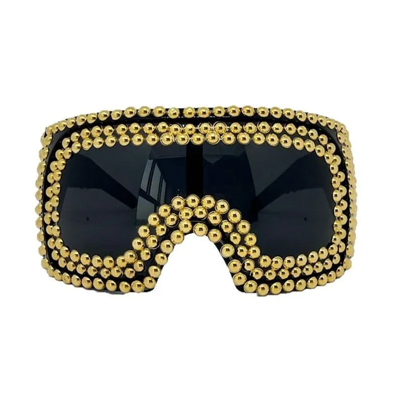 Men's punk-inspired large rim square sunglasses with visible rivet detailing in silver colour