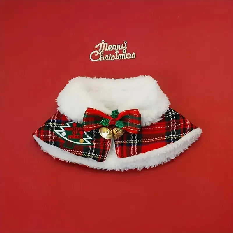 Red holiday pet scarf with bell motif wrapped around dog's neck for Christmas