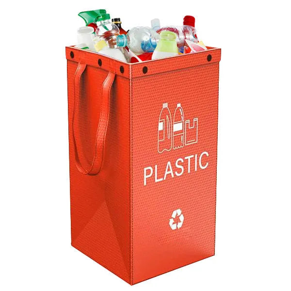 A blue 40-litre waterproof handbag-style rubbish bin made from PP plastic, shown beside furniture.