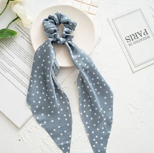Spring dark green cloth hair tie with large intestine ring design and floral bandeau decoration
