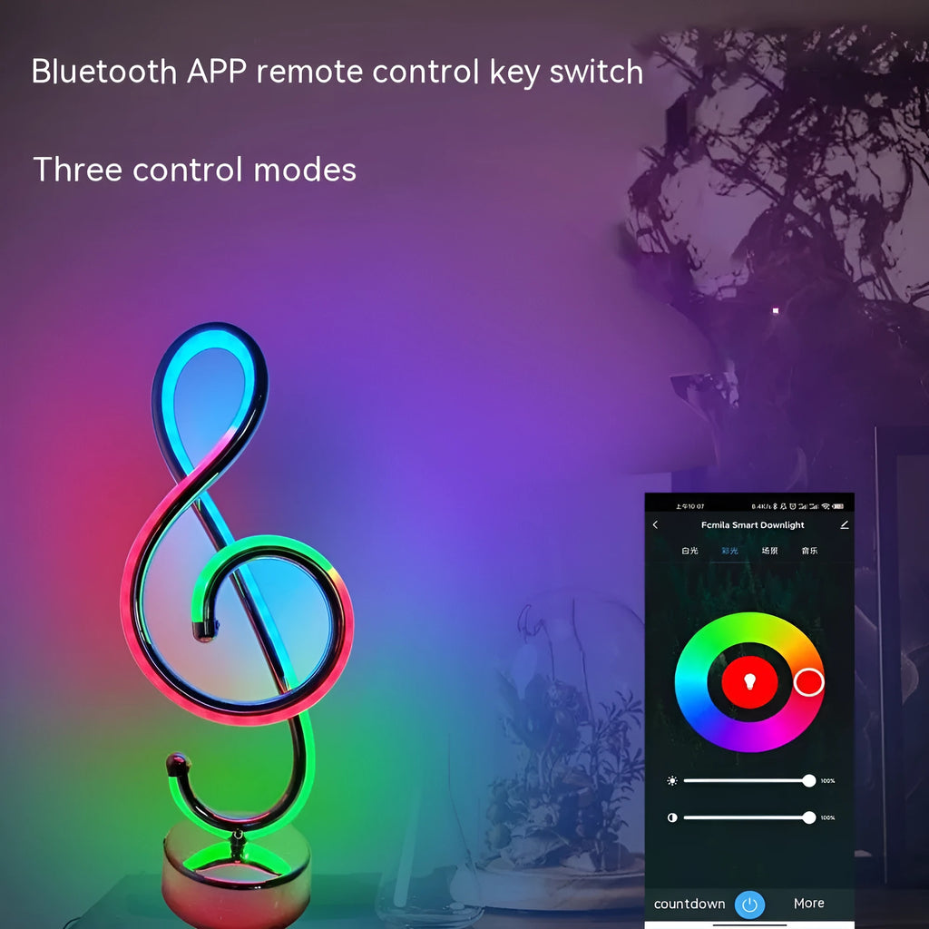 Black musical note shaped Bluetooth light with remote control and RGB colour changing capabilities
