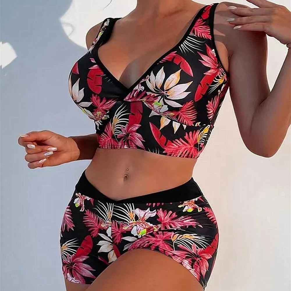 Women's two-piece swimsuit set with sleeveless top and printed boxer-style briefs in multiple colours.