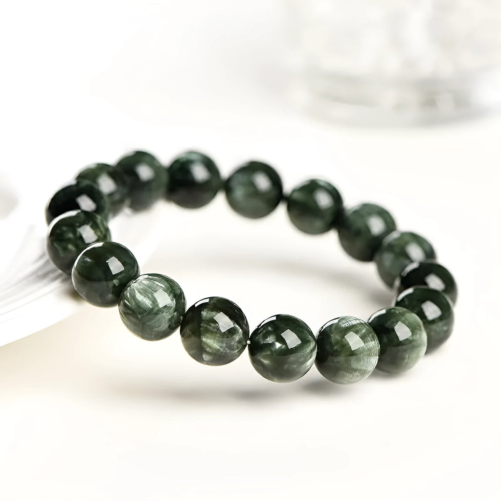 Green Dragon Crystal bracelet with 8-9mm round beads and geometry design featuring Ruyi elements