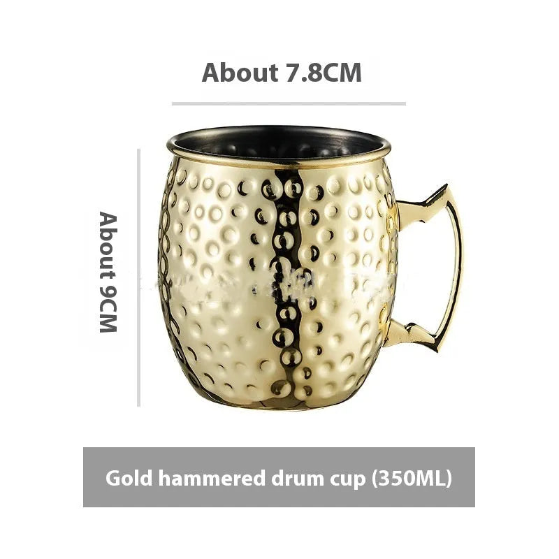 Stainless steel Moscow Mule cup with copper plating in hammer point style showing metallic finish.