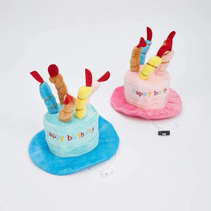 Blue and pink birthday hats for small dogs with elastic bands, shown with dimensions 21cm by 15cm.